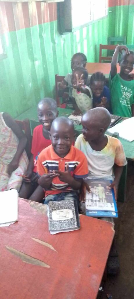 Liberia school kids doing homework