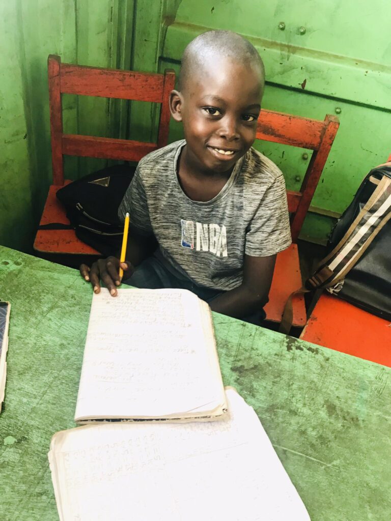 Liberia school kid doing homework